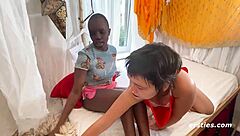 marie straps on and rides blue's wet pussy doggystyle in bedroom intimacy