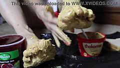 Muscular milf smears peanut butter on toes for footjob fantasy