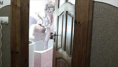 Naked blonde milf showers as roommate jerks cock watching cumshot