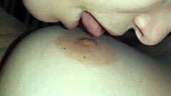 lesbian threesome features licking kissing sucking nipples