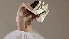 blonde gymnast stretches naked in gym yoga poses