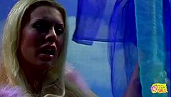 gorgeous blonde fingers wet pussy then brunette strap-on fucks her cowgirl style close up