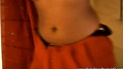 brunette indian beauty strips teasing erotically undressing nude