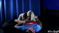 The masked couple in white bodysuits shares a teasing home session with playful touches and close moments.