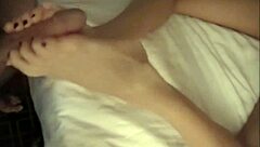 Erin's toes grip and stroke cock to explosive footjob finish