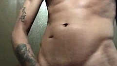 check out this tattooed amateur stud flashing his huge cock for the camera in solo tease