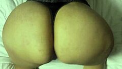 Woman flaunts her impressively large round booty