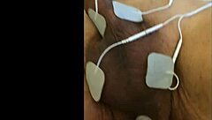 guy tries fisting with electrodi gadget close up