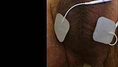 guy tries fisting with electrodi gadget close up