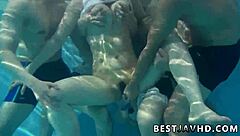 suzuna komiya's massive tits bounce as she sucks cock poolside in wild jav group bang