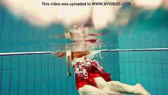 hot polish teen marketa teases small tits underwater at beach pool