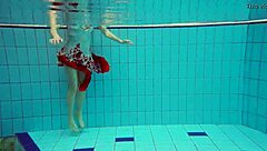 hot polish teen marketa teases small tits underwater at beach pool