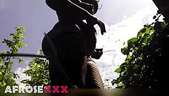 Naughty pantyhose babe tempts in the lush garden—ready to rip them off?