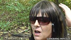 Wife gulps down cumshots and piss from group at highway orgy