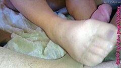 german granny in nylons teases young guy's cock with her hairy feet close up