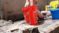 village bhabhi bathes outdoors flashing big tits juicy pussy at ranch