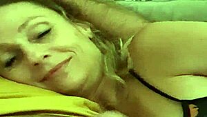 Blonde milf couple delivers intense handjob to orgasm with cumshot on beautiful tits