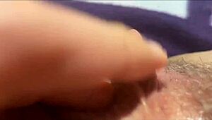 this close-up shows an amateur reaching intense vaginal orgasm through clit masturbation