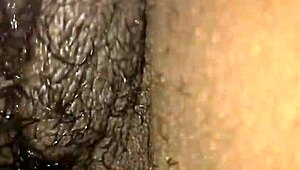 ebony babe plays with wet pussy using vibrator and huge black cock toy.