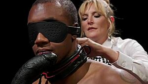 hey, this blonde domme is anal fucking her black male slave with a strapon 😈