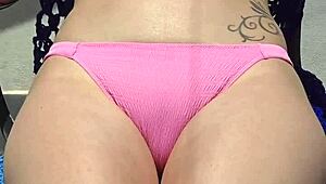 Rubbing suncream on tits during public sunbathing. Blonde housewife flashes petite body at the beach.