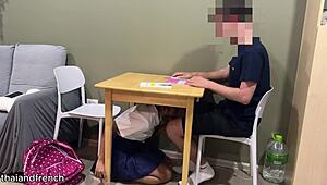 that cute 18yo thai teen student kneels under desk sucking her english teacher's throbbing cock hard