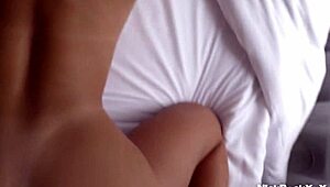 Tropican beauty with pierced pussy spreads legs wide open