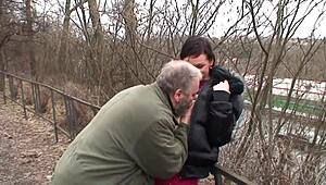 Hey, wanna see a young brunette with small tits swallow cum in the park from an older guy? Bet you can't resist this wild scene!