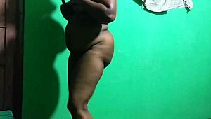 the indian horny milf wife uses an umbrella in her solo play