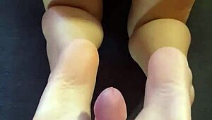 i jerk off with her feet and cum all over her