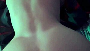 A young couple shares a quick intimate moment together