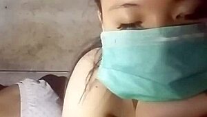 Gogo Dancing Asian Girl Showcasing Her Big Tits