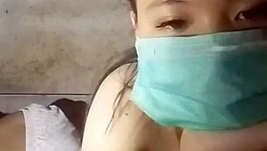 Gogo Dancing Asian Girl Showcasing Her Big Tits