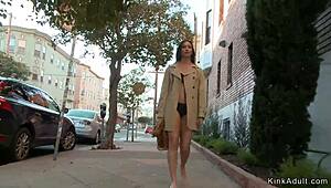 Brunette slave sucks hard in a dusty records shop