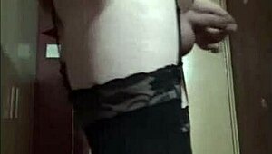 bisexual crossdresser plays sissy, shooting a cumshot with a strap-on dildo deep inside. he dreams of a real cock filling him up.