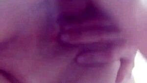 Amateurs bathing in shower bent over.