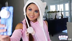 Petite Asian girlfriend eagerly swallows boyfriend's cock on Asianspanks.com