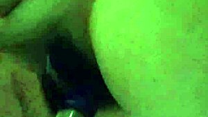 Teasing hairy pussy with dildo toys