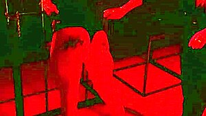 Handcuffed blonde endures hot wax backstage