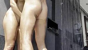 Blonde teen gets deepthroated and fucked in the shower, kissing passionately.