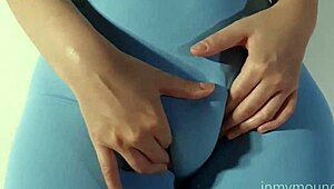 Novinha in Blue Leggings Teases with Puffy Tits and Cameltoe Display