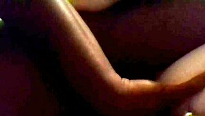 Mature babe gives titty fuck massage