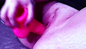 Intensely fucking my pink dildo while wearing heels and stockings.