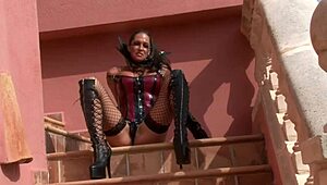 Watch the horny German bitch dance with her boobs and cock!