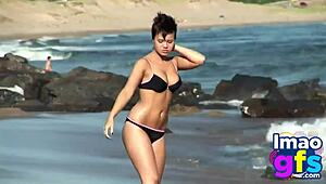 hey, check out this hot brunette in lingerie on the beach, she's all about that outdoor masturbation vibe