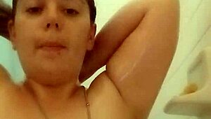 brunette bathing in the shower