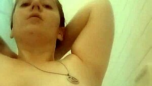 brunette bathing in the shower