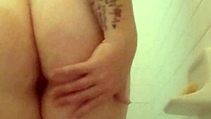 brunette bathing in the shower