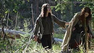 I masturbate next to another girl outdoors.