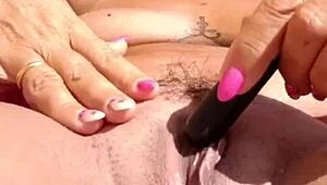 Wow, that milf's huge pussy lips are amazing as she cums hard like a slut! 😍